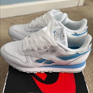 Angel Reese - Unapologetically Reebok 
 White and Baby Blue Shoes